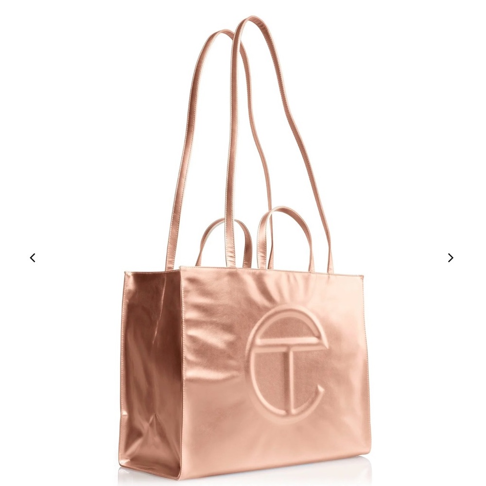 Gently used as a carry on bag Copper Shopping bag